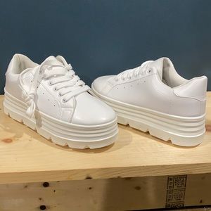 NWT White platform sneakers.